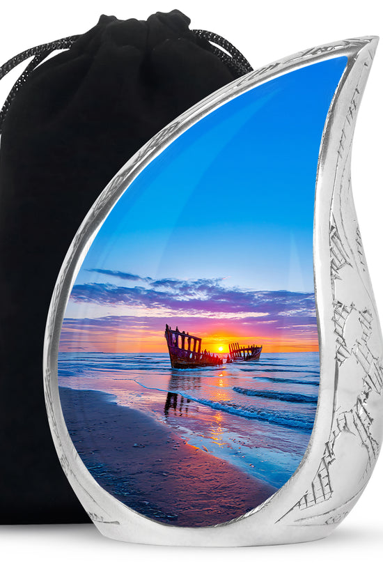 Icy Blue Beach Cremation Urn front view showing detailed design - rounded teardrop beach design with delicate detail - full-size 10 inch 200 cubic inch adult cremation urn