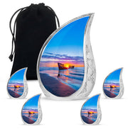Twilight Blue Beach Cremation Urn side profile showing urn shape - graceful tear-shaped urn with beach motif - memorial set with one large and four small urns
