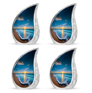 Cobalt Blue Beach Cremation Urn close-up of engraving and surface detail - smooth teardrop contour featuring beach art - 10 inch aluminum urn for cremated remains