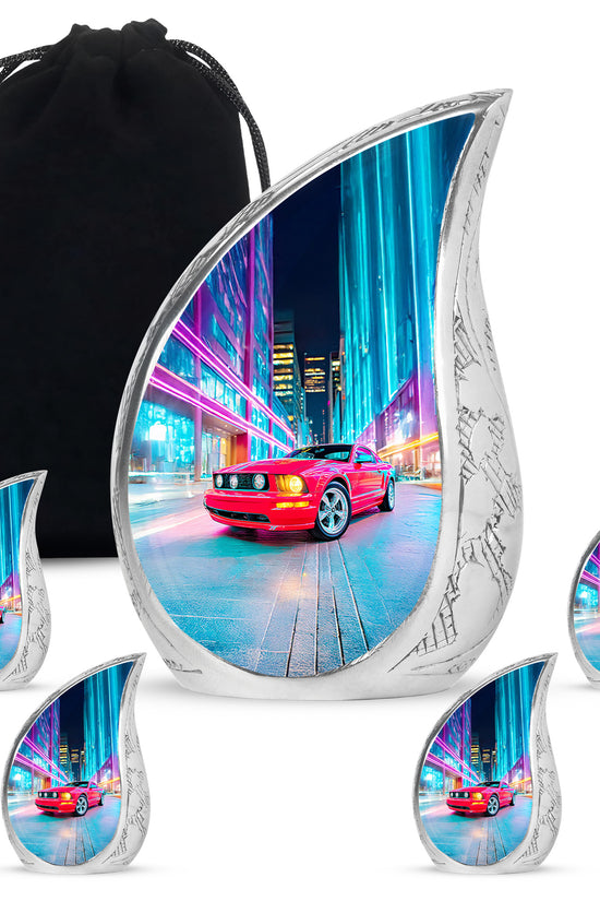 Azure Car Cremation Urn side profile showing urn shape - flowing teardrop car silhouette on curved aluminum - memorial set with one large and four small urns