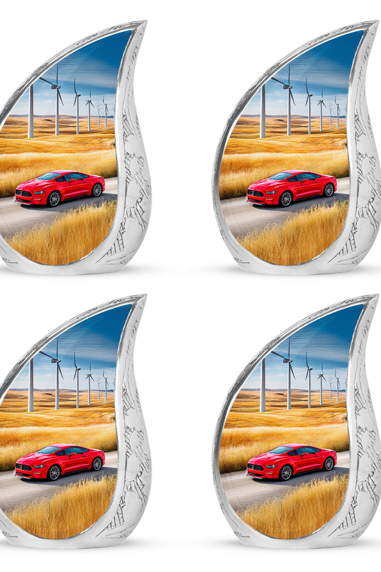 Vivid Blue Car Cremation Urn close-up of engraving and surface detail - graceful tear-shaped urn with car motif - 10 inch aluminum urn for cremated remains