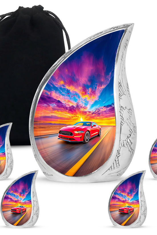 Misty Blue Car Cremation Urn side profile showing urn shape - flowing teardrop car silhouette on curved aluminum - memorial set with one large and four small urns