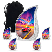 Misty Blue Car Cremation Urn side profile showing urn shape - flowing teardrop car silhouette on curved aluminum - memorial set with one large and four small urns