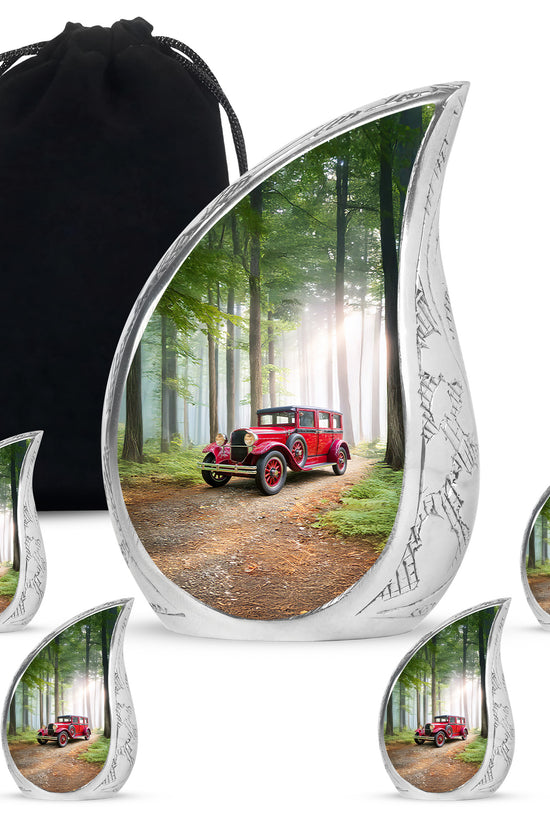 Jade Green Car Cremation Urn side profile showing urn shape - flowing teardrop car silhouette on curved aluminum - memorial set with one large and four small urns
