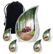 Jade Green Car Cremation Urn side profile showing urn shape - flowing teardrop car silhouette on curved aluminum - memorial set with one large and four small urns