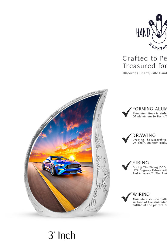 Celestial Blue Car Cremation Urn angled view of lid and engraved motif - rounded teardrop car design with delicate detail - mini keepsake memorial for portion of cremation ashes