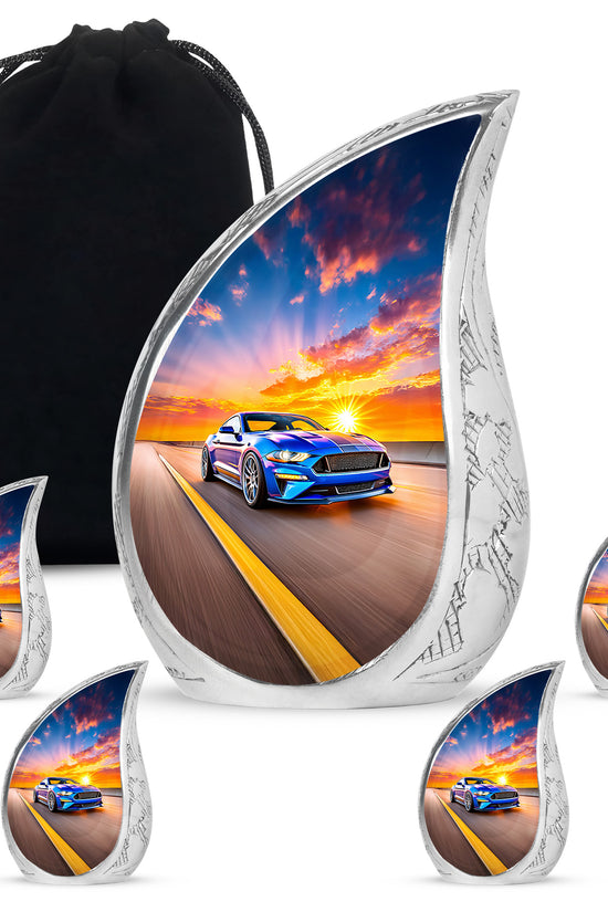 Sky Blue Car Cremation Urn side profile showing urn shape - rounded teardrop car design with delicate detail - memorial set with one large and four small urns