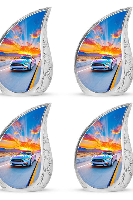 Dusty Blue Car Cremation Urn close-up of engraving and surface detail - flowing teardrop car silhouette on curved aluminum - 10 inch aluminum urn for cremated remains