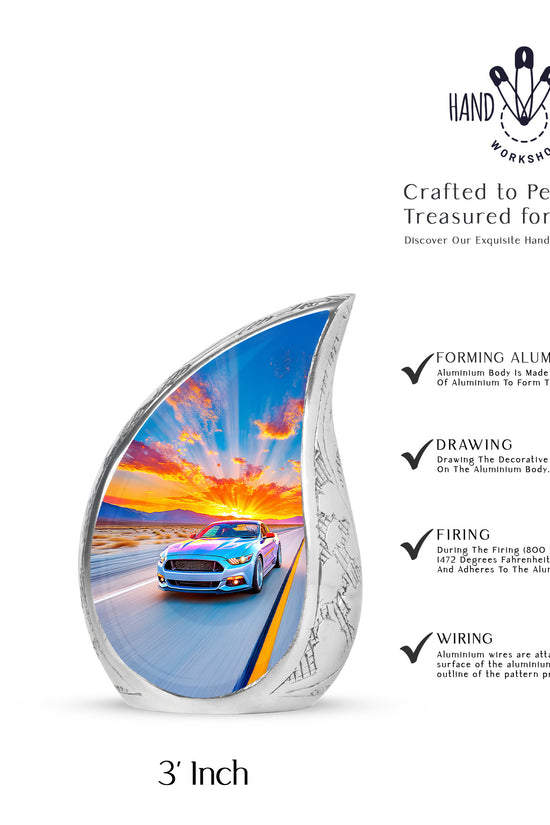 Azure Car Cremation Urn angled view of lid and engraved motif - flowing teardrop car silhouette on curved aluminum - mini keepsake memorial for portion of cremation ashes