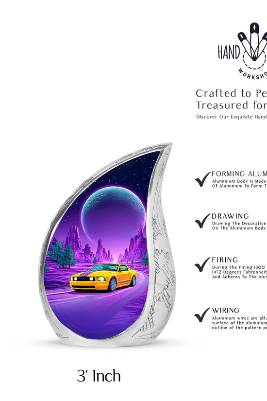 Calming Blue Car Cremation Urn angled view of lid and engraved motif - graceful tear-shaped urn with car motif - mini keepsake memorial for portion of cremation ashes
