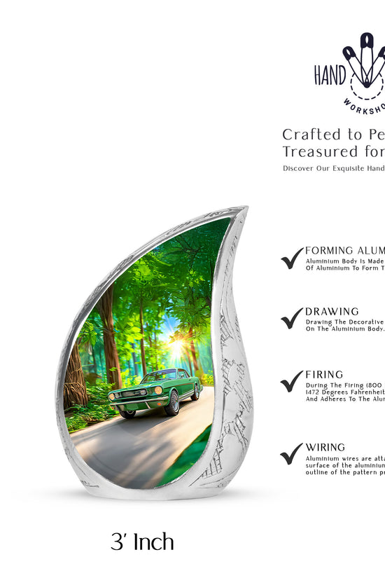 Hunter Green Car Cremation Urn angled view of lid and engraved motif - graceful tear-shaped urn with car motif - mini keepsake memorial for portion of cremation ashes