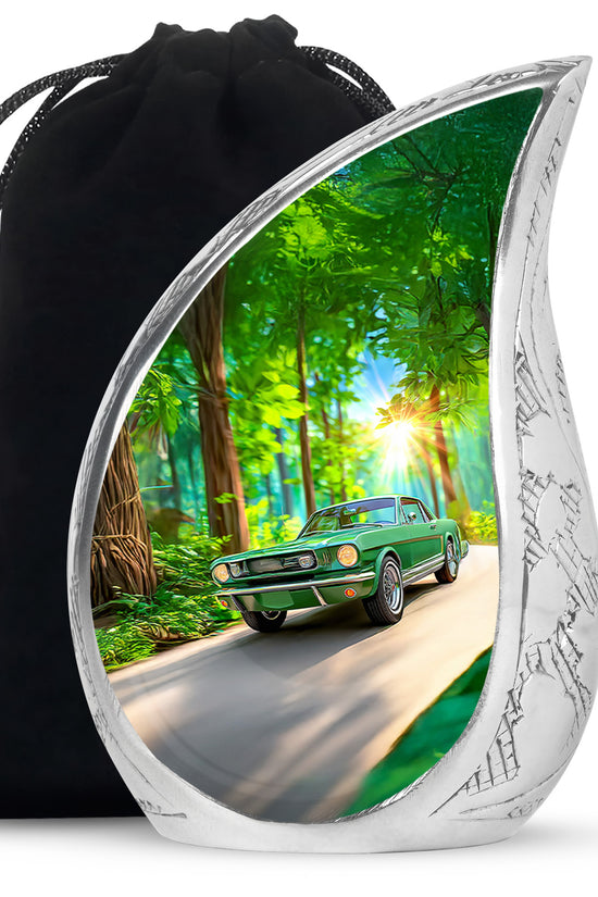 Moss Green Car Cremation Urn front view showing detailed design - flowing teardrop car silhouette on curved aluminum - full-size 10 inch 200 cubic inch adult cremation urn