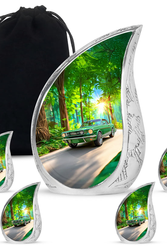 Jade Green Car Cremation Urn side profile showing urn shape - flowing teardrop car silhouette on curved aluminum - memorial set with one large and four small urns