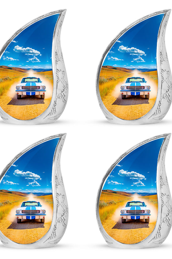 Dusty Blue Car Cremation Urn close-up of engraving and surface detail - flowing teardrop car silhouette on curved aluminum - 10 inch aluminum urn for cremated remains