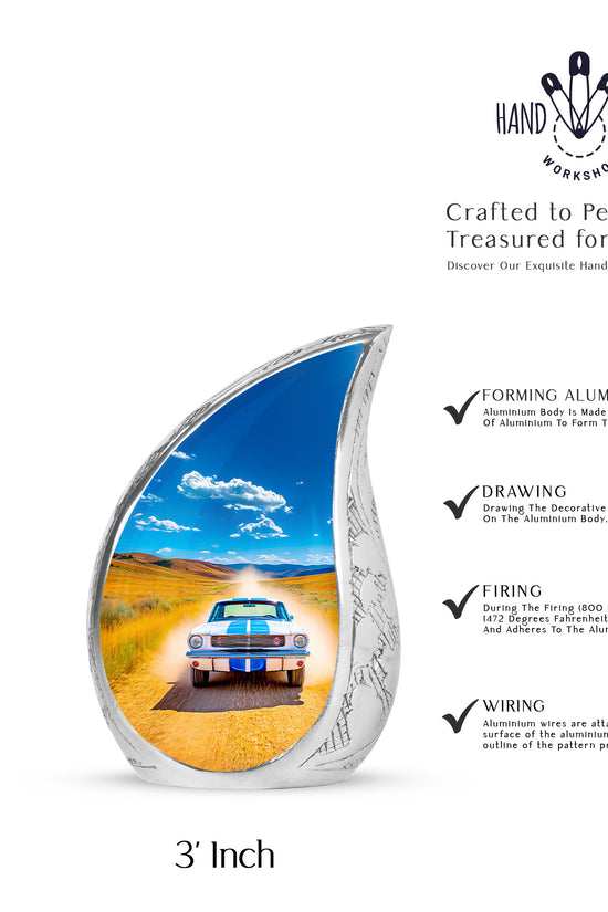 Royal Blue Car Cremation Urn angled view of lid and engraved motif - smooth teardrop contour featuring car art - mini keepsake memorial for portion of cremation ashes