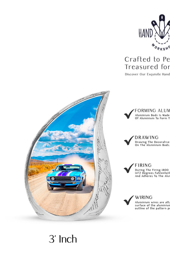 Cornflower Blue Car Cremation Urn angled view of lid and engraved motif - smooth teardrop contour featuring car art - mini keepsake memorial for portion of cremation ashes