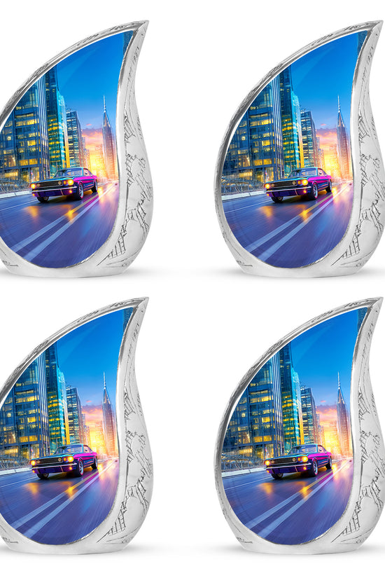 Calming Blue Car Cremation Urn close-up of engraving and surface detail - smooth teardrop contour featuring car art - 10 inch aluminum urn for cremated remains