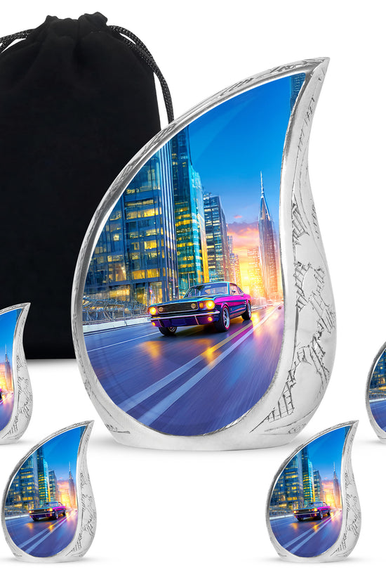 Sapphire Blue Car Cremation Urn side profile showing urn shape - smooth teardrop contour featuring car art - memorial set with one large and four small urns