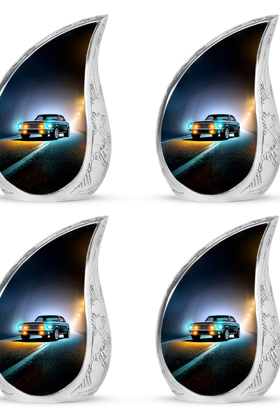 Onyx Black Car Cremation Urn close-up of engraving and surface detail - smooth teardrop contour featuring car art - 10 inch aluminum urn for cremated remains