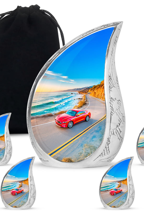 Icy Blue Car Cremation Urn side profile showing urn shape - rounded teardrop car design with delicate detail - memorial set with one large and four small urns