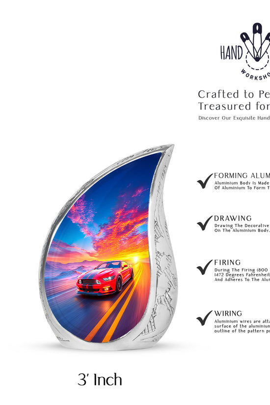 Bright Blue Car Cremation Urn angled view of lid and engraved motif - graceful tear-shaped urn with car motif - mini keepsake memorial for portion of cremation ashes