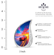 Bright Blue Car Cremation Urn angled view of lid and engraved motif - graceful tear-shaped urn with car motif - mini keepsake memorial for portion of cremation ashes