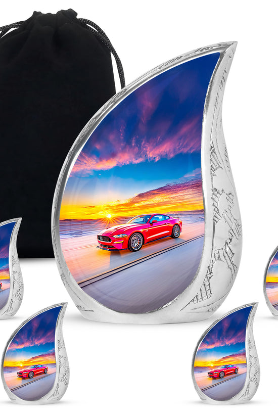 Sapphire Blue Car Cremation Urn side profile showing urn shape - smooth teardrop contour featuring car art - memorial set with one large and four small urns