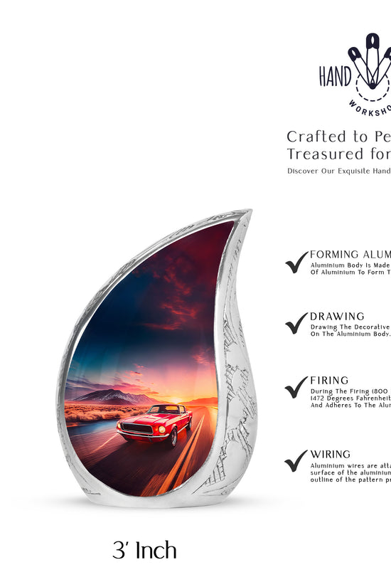 Cobalt Blue Car Cremation Urn angled view of lid and engraved motif - graceful tear-shaped urn with car motif - mini keepsake memorial for portion of cremation ashes