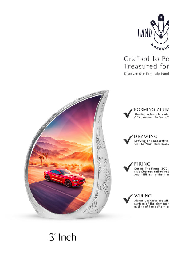 Salmon Pink Car Cremation Urn angled view of lid and engraved motif - smooth teardrop contour featuring car art - mini keepsake memorial for portion of cremation ashes