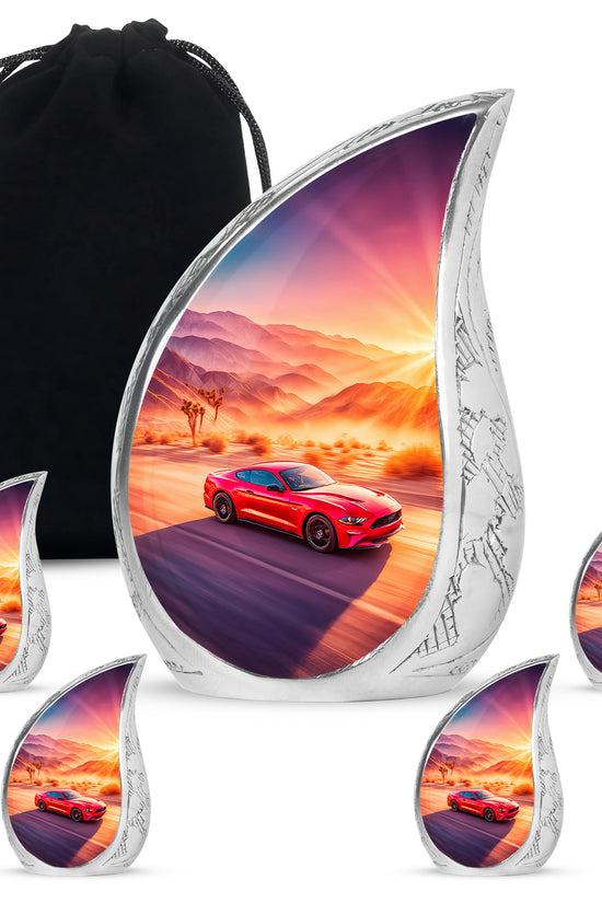 Pastel Pink Car Cremation Urn side profile showing urn shape - flowing teardrop car silhouette on curved aluminum - memorial set with one large and four small urns