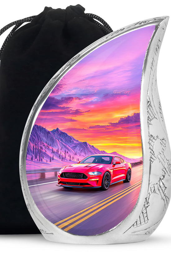 Pastel Blue Car Cremation Urn front view showing detailed design - flowing teardrop car silhouette on curved aluminum - full-size 10 inch 200 cubic inch adult cremation urn
