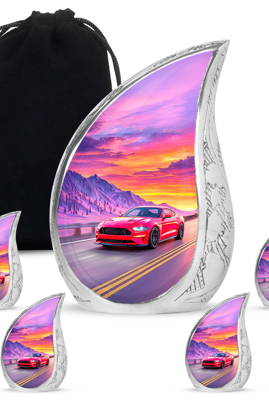 Dusty Blue Car Cremation Urn side profile showing urn shape - flowing teardrop car silhouette on curved aluminum - memorial set with one large and four small urns