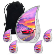 Dusty Blue Car Cremation Urn side profile showing urn shape - flowing teardrop car silhouette on curved aluminum - memorial set with one large and four small urns