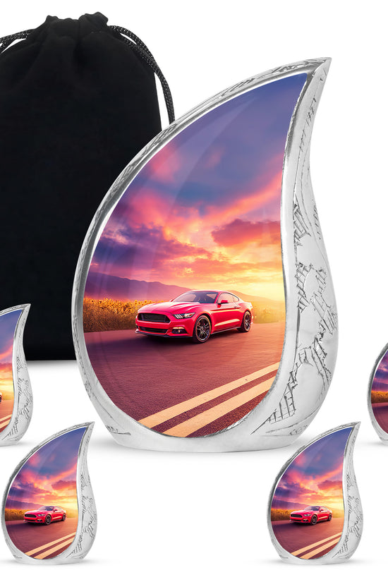 Soft Blue Car Cremation Urn side profile showing urn shape - graceful tear-shaped urn with car motif - memorial set with one large and four small urns