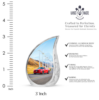 Sky Blue Car Cremation Urn angled view of lid and engraved motif - rounded teardrop car design with delicate detail - mini keepsake memorial for portion of cremation ashes