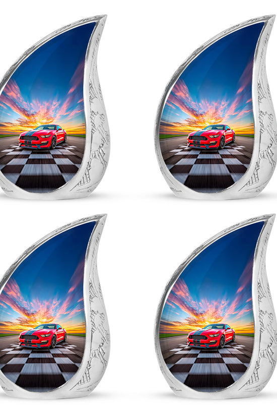 Cornflower Blue Car Cremation Urn close-up of engraving and surface detail - smooth teardrop contour featuring car art - 10 inch aluminum urn for cremated remains