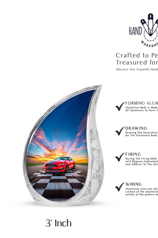 Slate Blue Car Cremation Urn angled view of lid and engraved motif - flowing teardrop car silhouette on curved aluminum - mini keepsake memorial for portion of cremation ashes