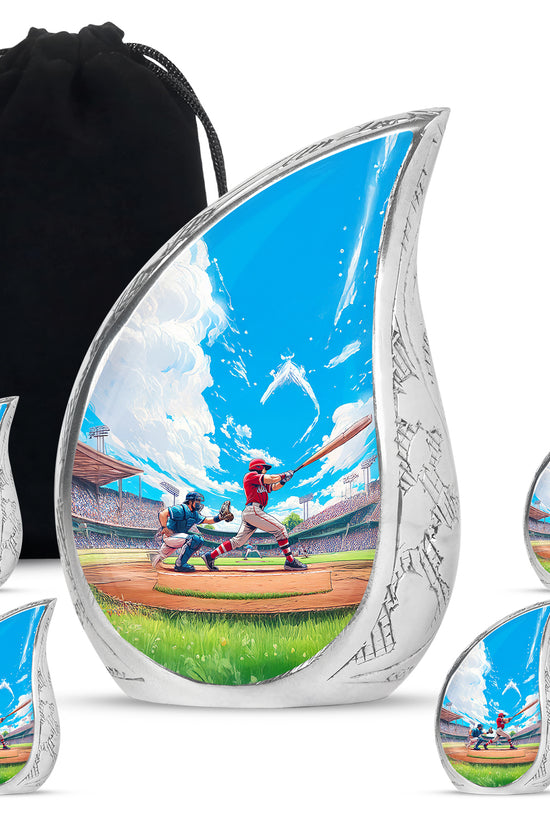 Icy Blue Baseball Cremation Urn side profile showing urn shape - rounded teardrop baseball design with delicate detail - memorial set with one large and four small urns