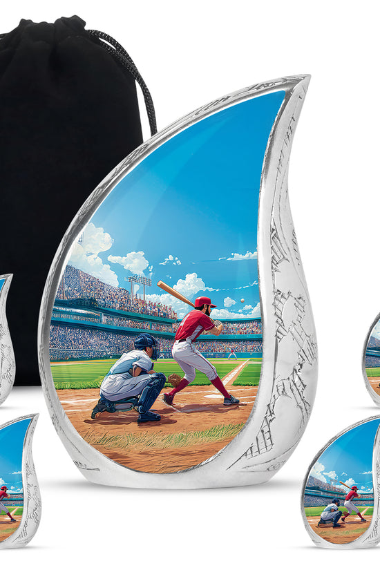 Navy Blue Baseball Cremation Urn side profile showing urn shape - flowing teardrop baseball silhouette on curved aluminum - memorial set with one large and four small urns