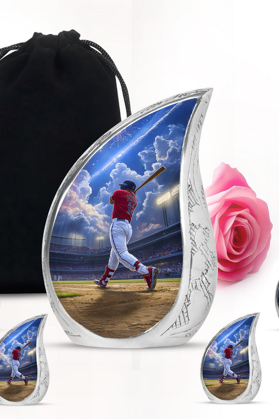 Dusty Blue Baseball Cremation Urn side profile showing urn shape - rounded teardrop baseball design with delicate detail - memorial set with one large and four small urns