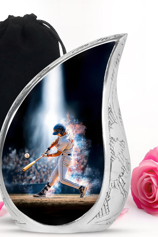 Deep Black Baseball Cremation Urn front view showing detailed design - flowing teardrop baseball silhouette on curved aluminum - full-size 10 inch 200 cubic inch adult cremation urn