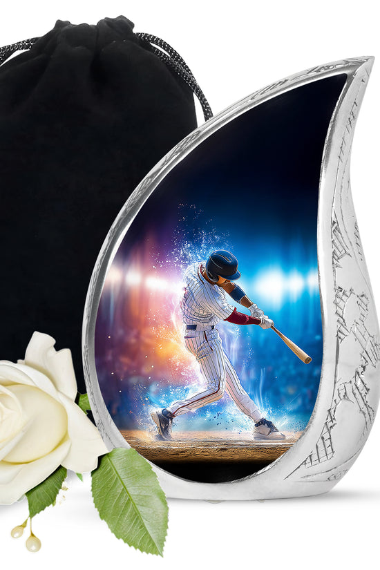 Ebony Baseball Cremation Urn front view showing detailed design - flowing teardrop baseball silhouette on curved aluminum - full-size 10 inch 200 cubic inch adult cremation urn