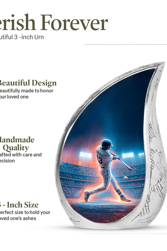 Slate Blue Baseball Cremation Urn angled view of lid and engraved motif - flowing teardrop baseball silhouette on curved aluminum - mini keepsake memorial for portion of cremation ashes