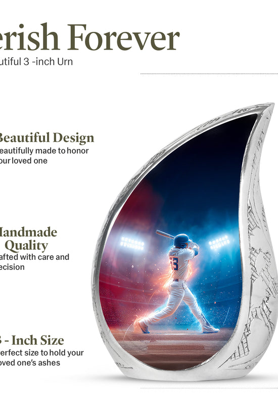 Serene Blue Baseball Cremation Urn angled view of lid and engraved motif - graceful tear-shaped urn with baseball motif - mini keepsake memorial for portion of cremation ashes