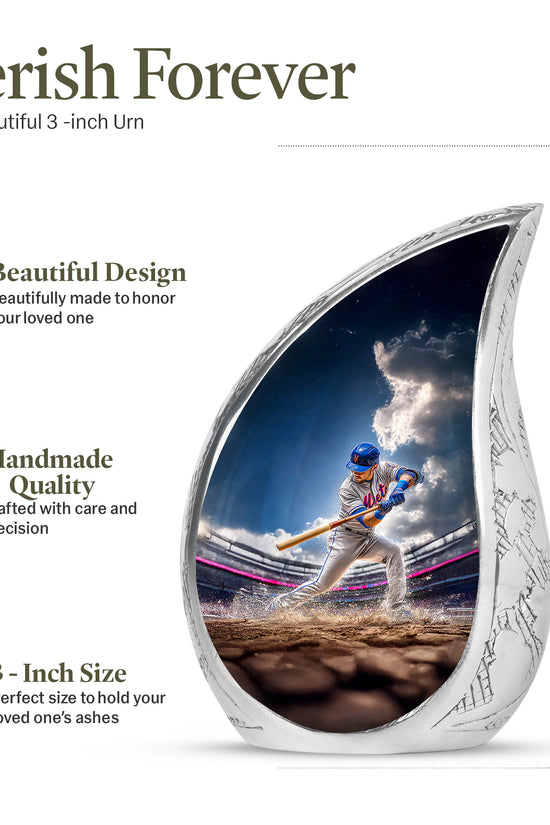 Dusty Blue Baseball Cremation Urn angled view of lid and engraved motif - flowing teardrop baseball silhouette on curved aluminum - mini keepsake memorial for portion of cremation ashes