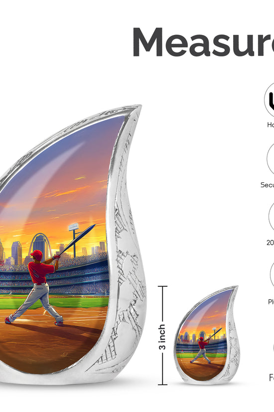 Champagne Gold Baseball Cremation Urn angled view of lid and engraved motif - rounded teardrop baseball design with delicate detail - mini keepsake memorial for portion of cremation ashes