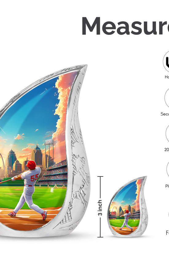 Slate Blue Baseball Cremation Urn angled view of lid and engraved motif - flowing teardrop baseball silhouette on curved aluminum - mini keepsake memorial for portion of cremation ashes