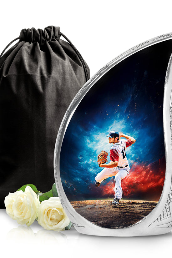 Sky Blue Baseball Cremation Urn front view showing detailed design - flowing teardrop baseball silhouette on curved aluminum - full-size 10 inch 200 cubic inch adult cremation urn