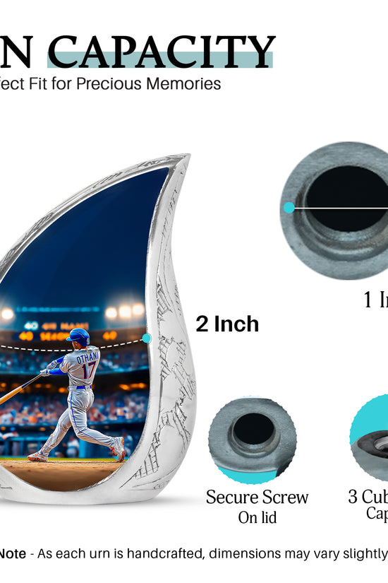Pastel Blue Baseball Cremation Urn angled view of lid and engraved motif - rounded teardrop baseball design with delicate detail - mini keepsake memorial for portion of cremation ashes