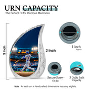 Pastel Blue Baseball Cremation Urn angled view of lid and engraved motif - rounded teardrop baseball design with delicate detail - mini keepsake memorial for portion of cremation ashes